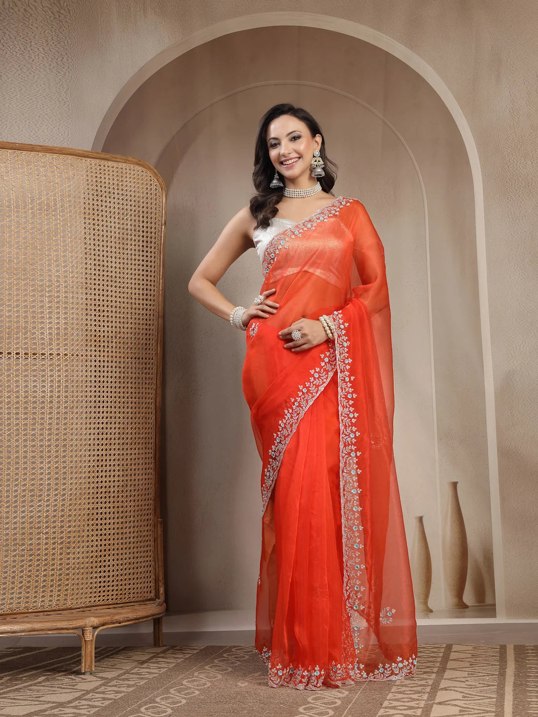 Side Drape View of Light Orange Floral Tissue Partywear Saree