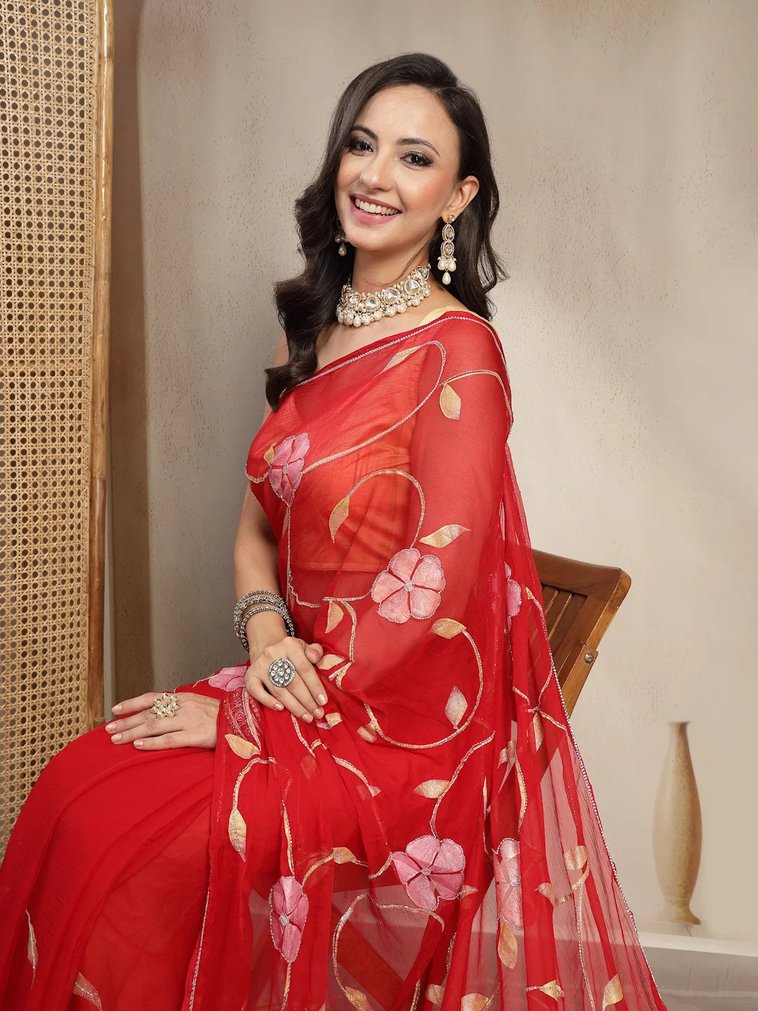 Model Portrait in Crimson Red Semi Chiffon Floral Saree