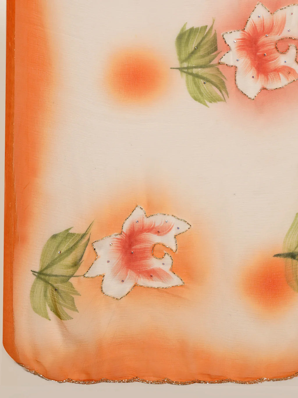 Close up View of Printed Semi Chiffon Fabric with Bright Orange Border