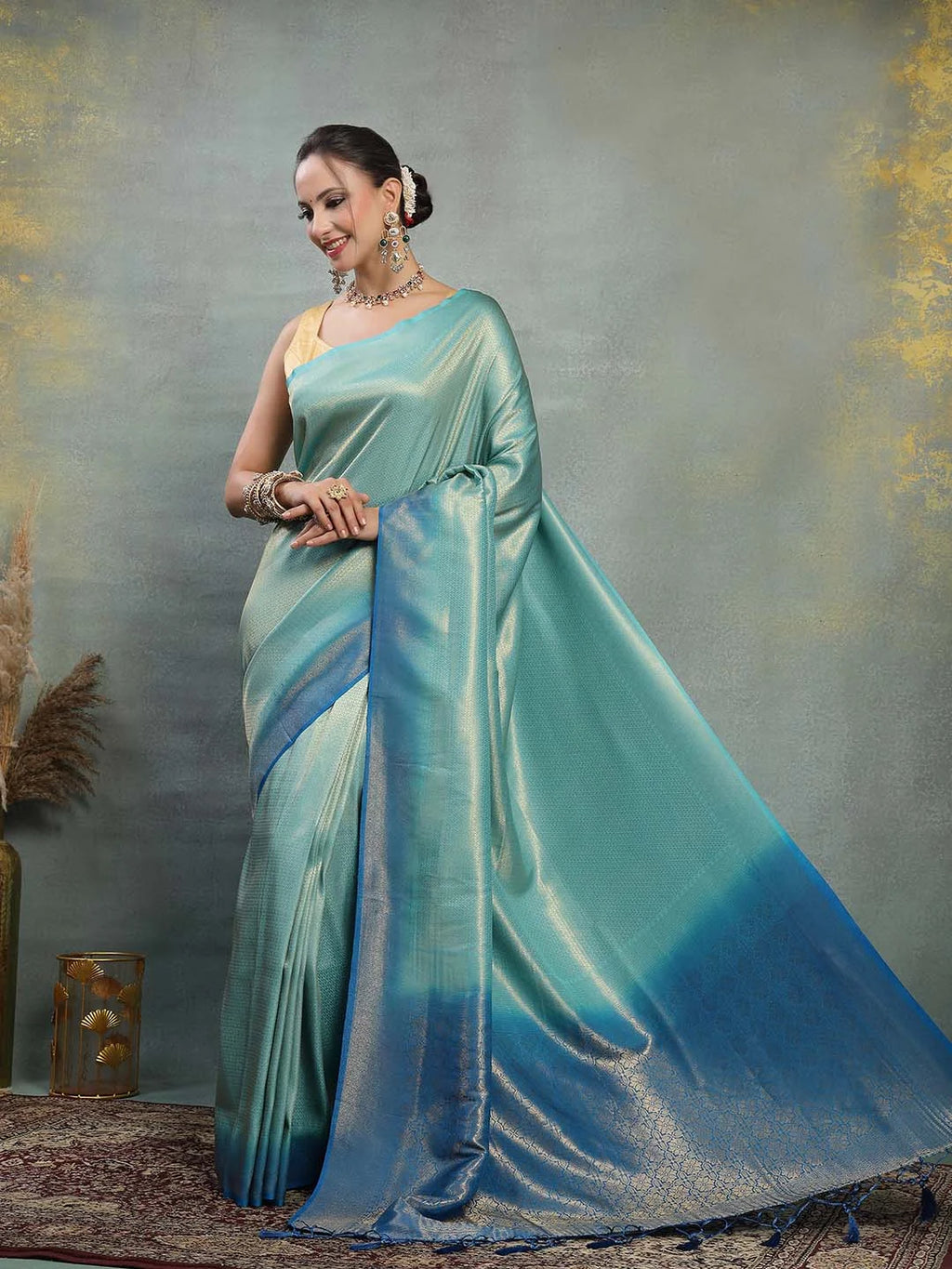 Side View of Firozi Aqua Blue Kanjivaram Silk Saree with Gold Zari Sheen