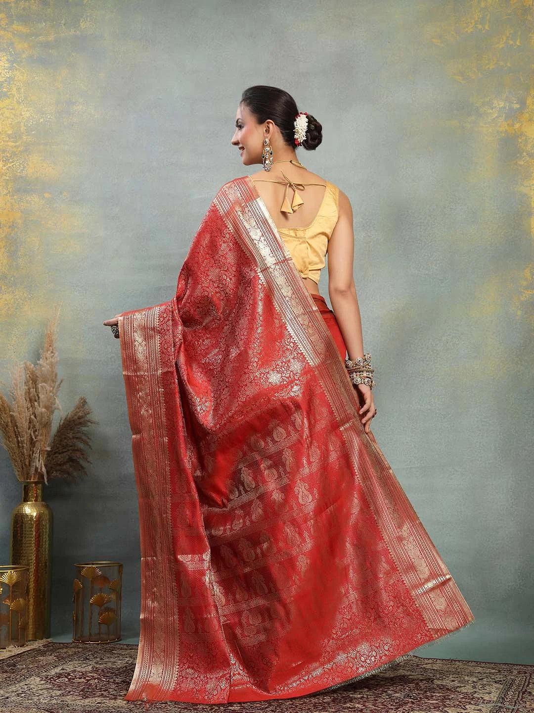 Back Drape View showing Graceful Fall of Red Gold Zari Silk Saree
