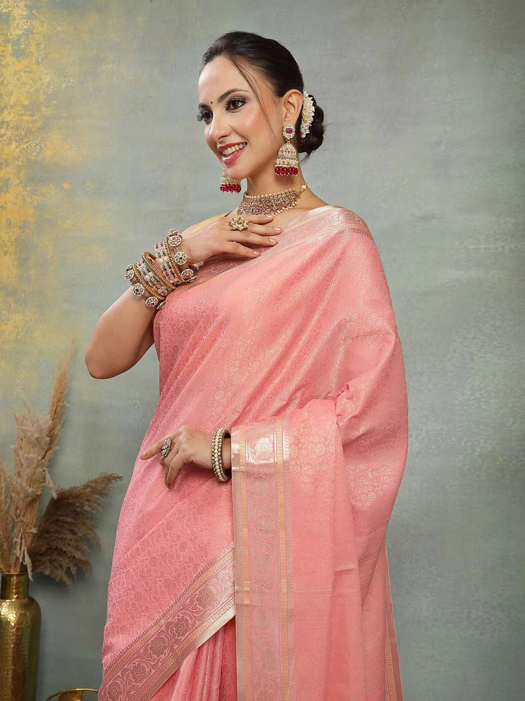 Model Wearing Soft Peach Banarasi Saree with Silver Zari