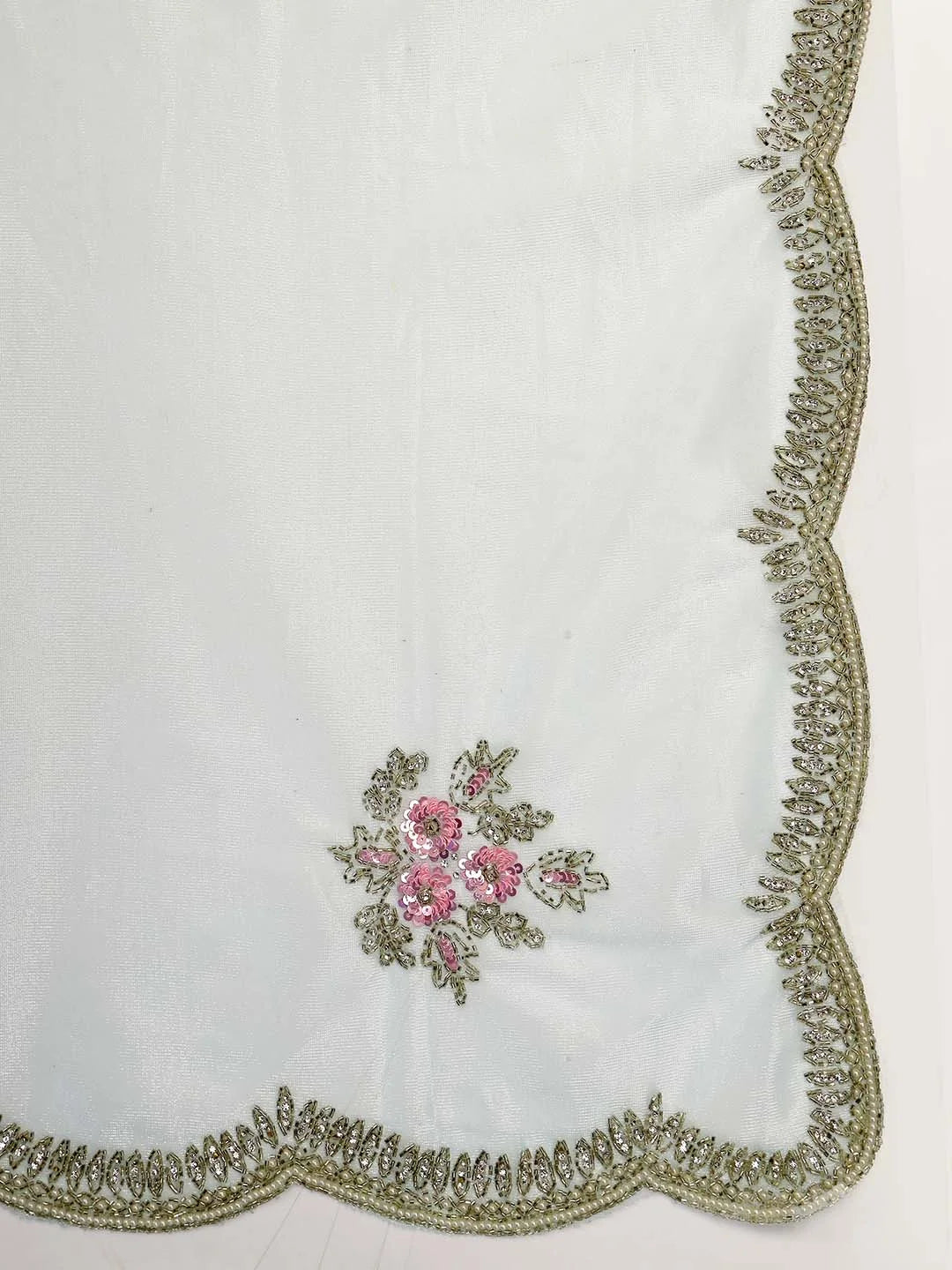 Close up View of Scalloped Border and Pink Floral Threadwork Motifs