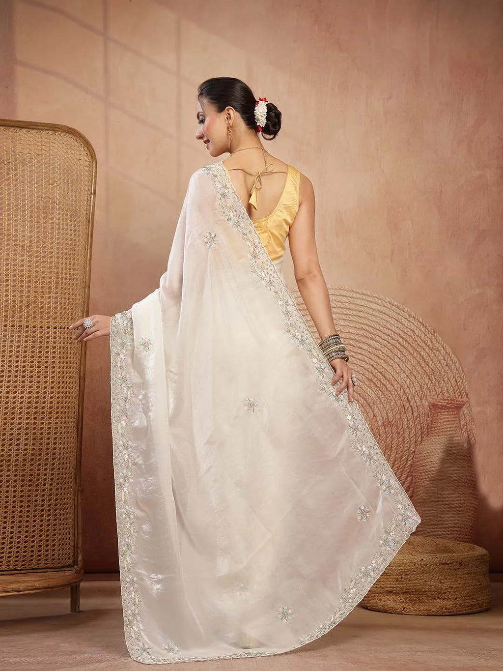 Back Angle View of Elegant Cream Silk Saree with Handwork Motifs