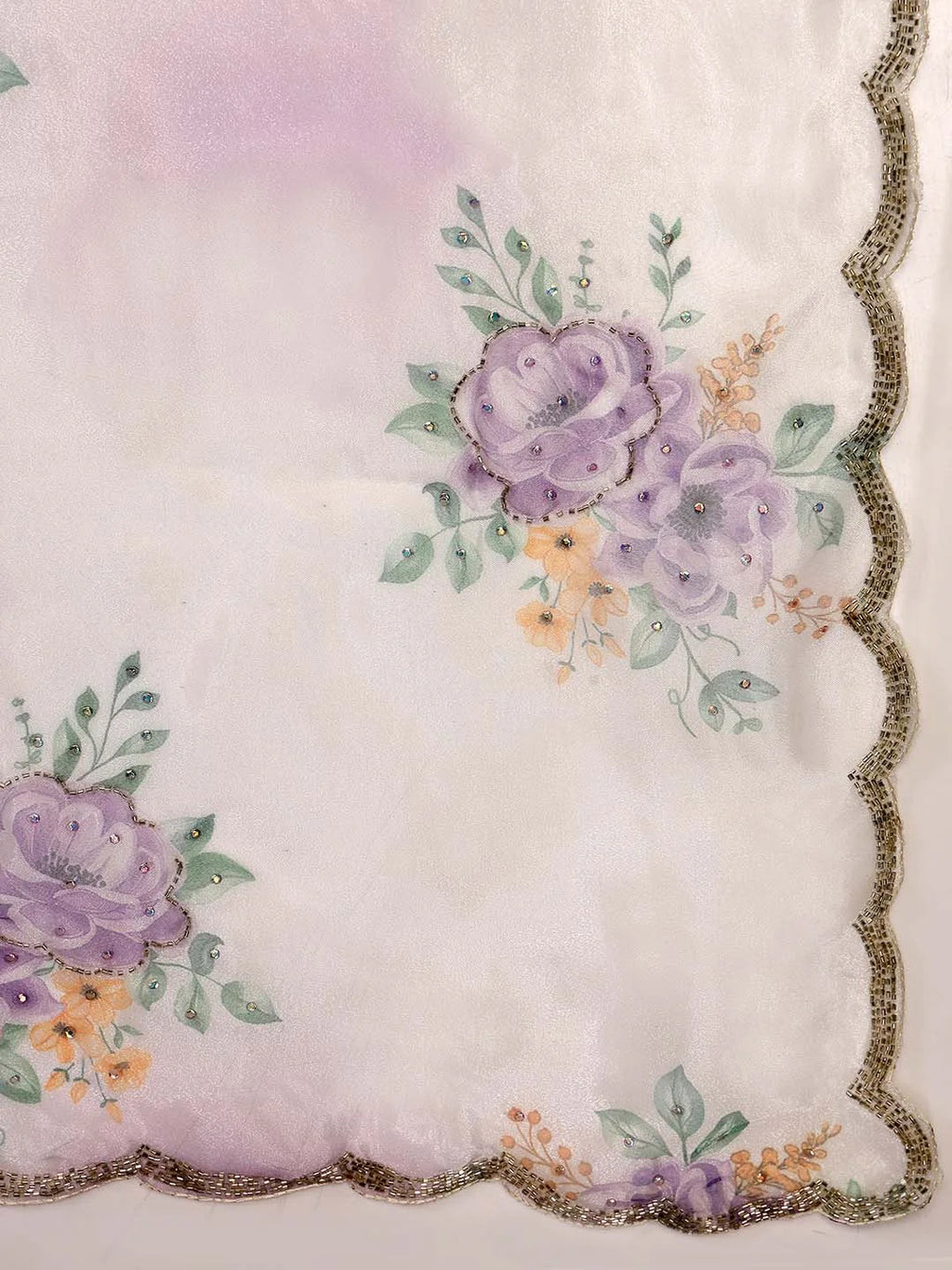 Close up View of Fine Scalloped Embroidery along Tissue Saree Border