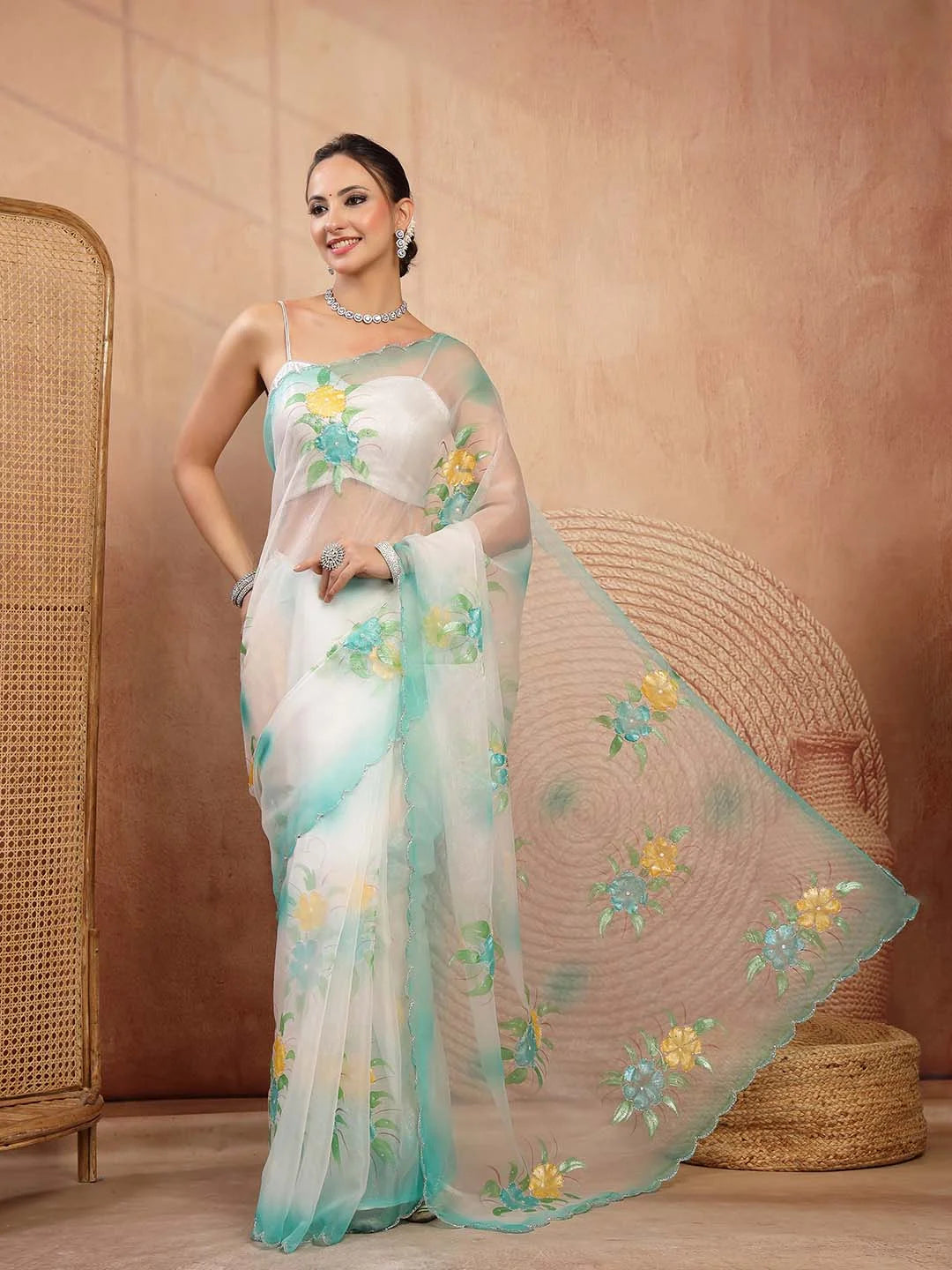 Model Portrait in Ivory and Green Handpainted Tissue Saree