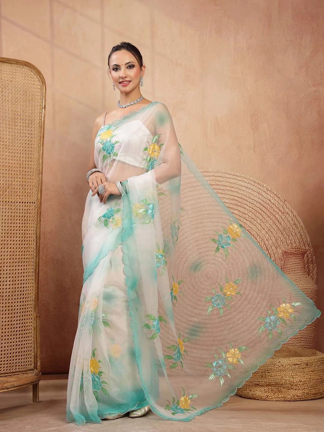 Ivory Soft Tissue Organza Saree with Turquoise Handpainted Floral Motifs - Sukunj