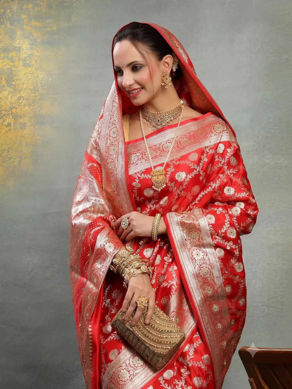 Model Sitting View in Red Banarasi Bridal Silk Saree