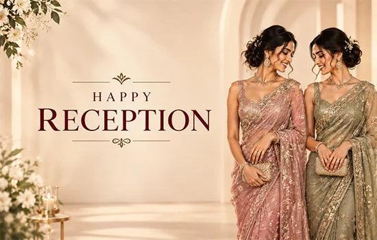 Two women in elegant embroidered sarees pose together for a reception function.